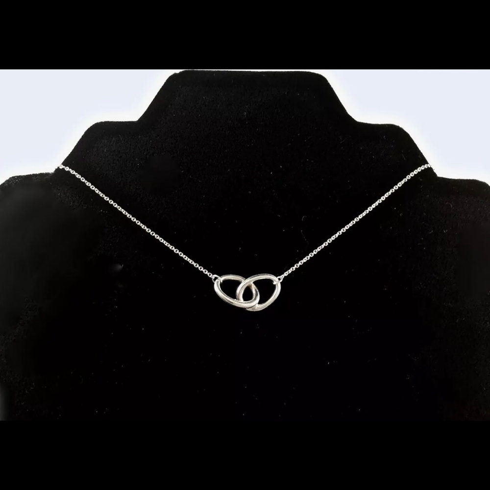 Tiffany & Co 16” interlocking oval necklace.